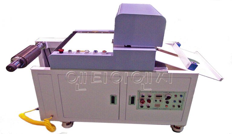 AUTO CUTTING M/C NT-2000M